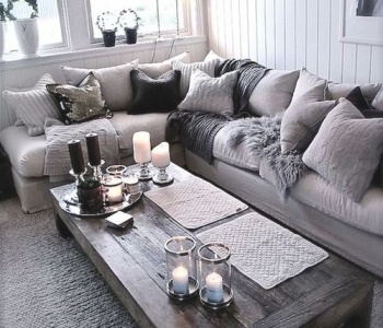 Cool grays, textures, and pillows galore make for a happy place on surroundedbypretty.com
